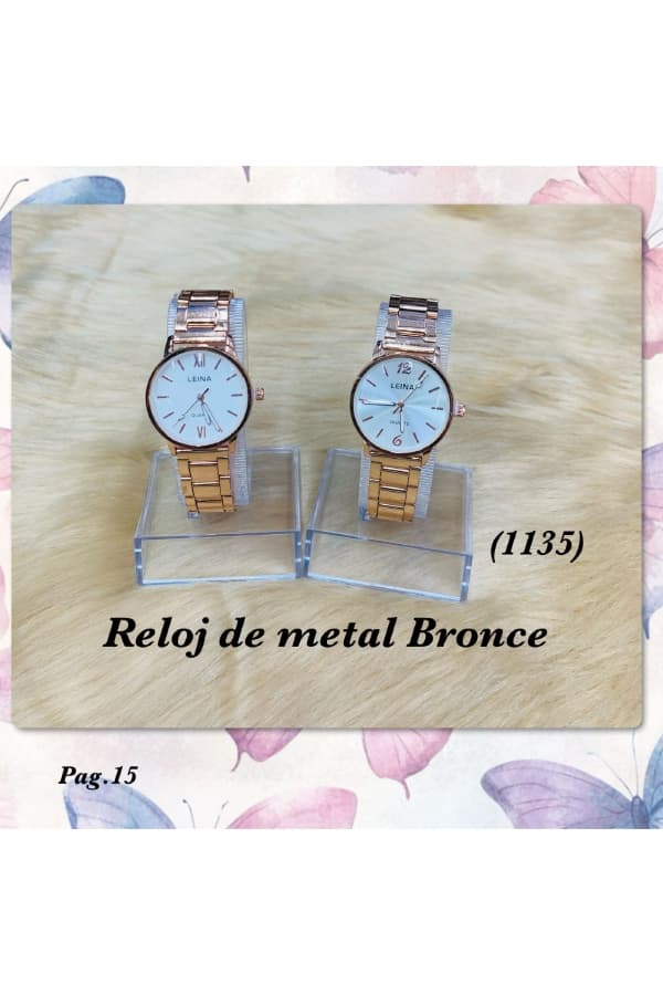 PAG.15 Reloj Metal en Bronce