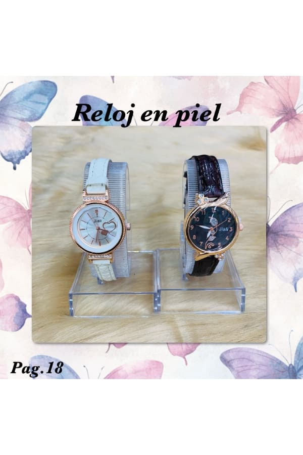PAG.18 Reloj P. (a)blanco (b)negro